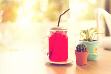 Strawberry juice with soda and ice in jar glassの写真素材