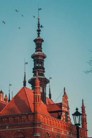 Ancient church with spires cityscape photo. Beautiful urban scenery photography with clear sky on...