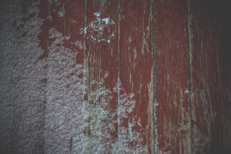 Close up old wooden door covered with frost concept photo. Winter weather. Front view photography with blurred background. High quality picture for wallpaper, travel blog, magazine, articleの写真素材