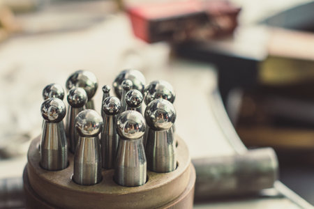 Close up jewelry studio equipment concept photo. Foundry workshop hobby. Front view photography with blurred background. High quality picture for wallpaper, travel blog, magazine, articleの写真素材