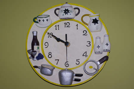 hours with elements of kitchen utensilsの写真素材