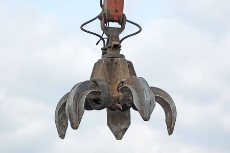 A huge mechanical claw in workの写真素材