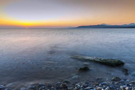 Beautiful Sunrise With Sea in Georgioupolis, Crete, Greeceの写真素材