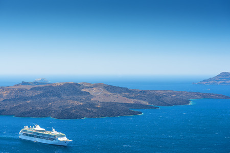 Cruise Ship Near Volcano On Island of Santoriniの写真素材