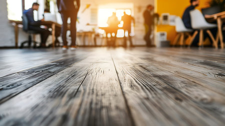 Wooden floor with blurred business people in the background. Selective focus.の素材