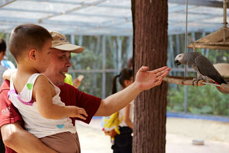 Happy family in the zooのeditorial素材