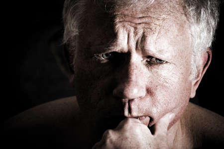 Portrait of a anxious man without skin retouchの写真素材