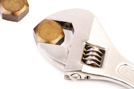 Wrench with nuts isolated on whiteの写真素材