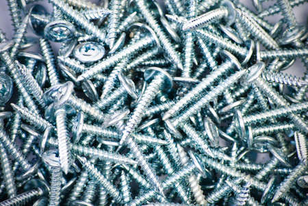 Collection of metal shiny screwsの写真素材