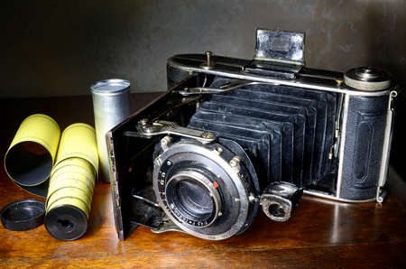 Antique bellows camera and original film used with this cameraの写真素材