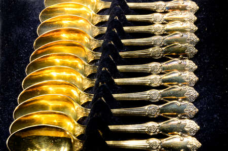Set of beautifully packaged vintage gold-plated teaspoonsの写真素材