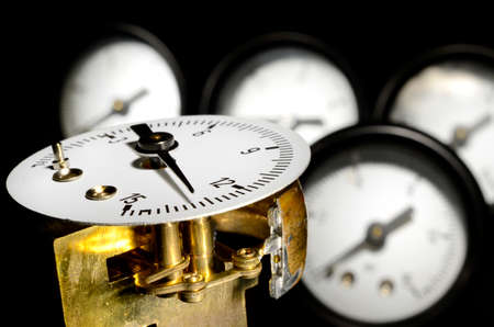 Close up of pressure gauge disassembled and gauges in backgroundの写真素材
