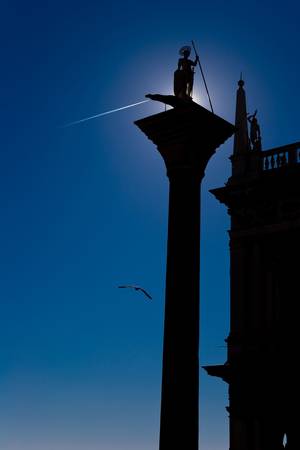 the column with st. todaro statue in San Marco place - Veniceの写真素材