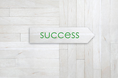 success signs on wood wallの写真素材
