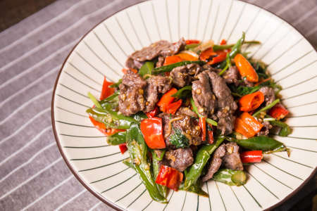 A plate of meat and chilliの写真素材