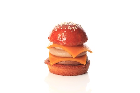 Big burger cake from marzipan. Isolated on white background.の写真素材