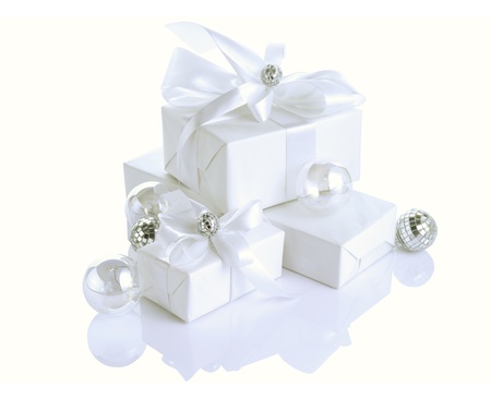 Christmas (birthday, Valentine's day, Wedding) presents with bow, isolated on white background.の写真素材