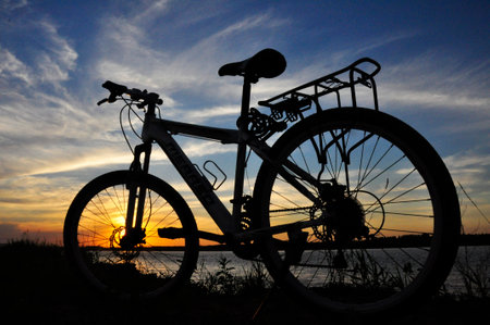 Evening bicycle silhouetteの写真素材