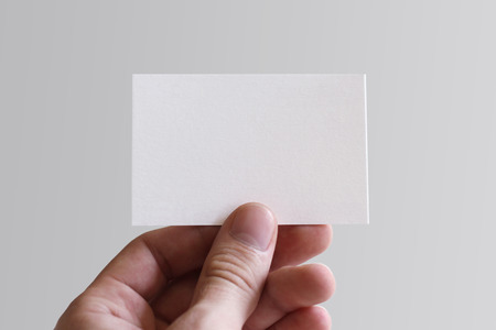 handheld, blank business card in horizontal orientationの写真素材