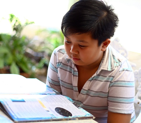 A child reading a bookの写真素材