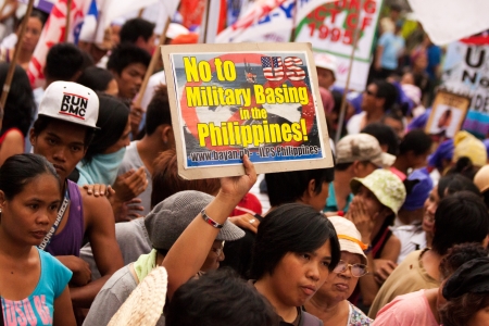 Manila, Philippines- March 8, 2013- Protest during International Womens Day celebration to opt out US military troops in the country.のeditorial素材