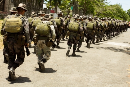 FORT STO. DOMINGO,STA ROSA CITY,LAGUNA- April 10, 2013: Participants of COMMANDO course program during a routine exercise held at Special Action Force school at Fort Sto.Domingo, Philippines.のeditorial素材