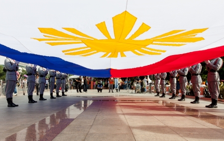 Luneta Park, Philippines -June 12, 2013: Philippines Vice President Jejomar Binay lead flag-raising ceremonies marking the 115th Independence Day of the country from the colonial rule of spain since 1898 in Cavite, Philippines.のeditorial素材