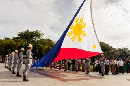 Luneta Park, Philippines -June 12, 2013: Philippines Vice President Jejomar Binay lead flag-raising ceremonies marking the 115th Independence Day of the country from the colonial rule of spain since 1898 in Cavite, Philippines.のeditorial素材