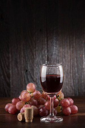 Still life glass of wine and grapesの写真素材
