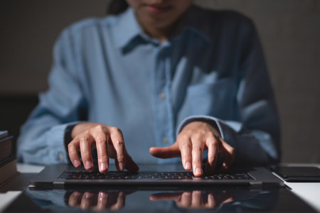 Closu up of student hands learning with typing on laptop. E-learning technology conceptの写真素材