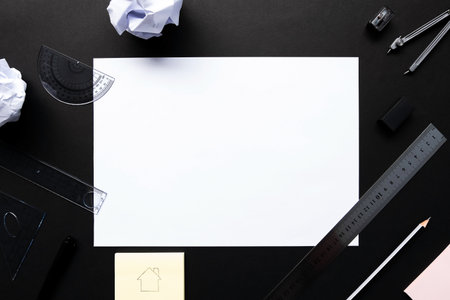 Top view of empty white sheet of paper with sketching tools or drawing toolsの写真素材
