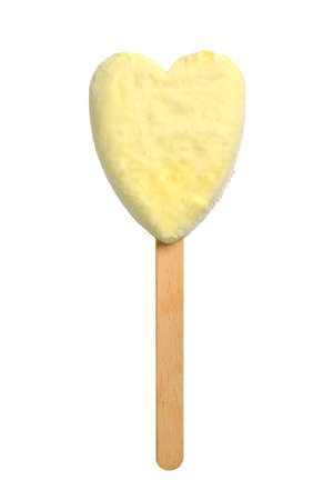 Vanilla ice lolly in heart shape on wooden stickの写真素材