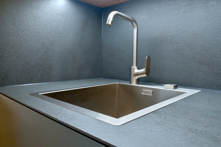 Stainless steel kitchen sink in a modern styleの写真素材