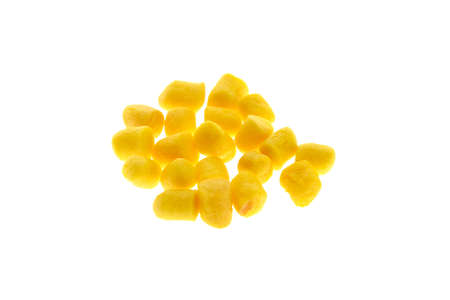 Close up view of yellow boilies, fishing baits for carp isolated on white backgroundの写真素材