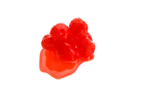 Close up view of red boilies in dip, fishing baits for carp isolated on white backgroundの写真素材