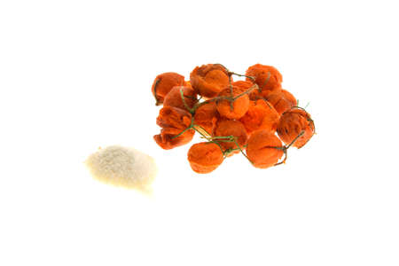 Close up view of orange boilies, fishing baits for carp isolated on white backgroundの写真素材