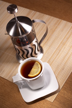 Cup of tea and french pressの写真素材