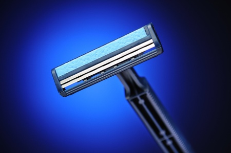 Double-blade shaver closeup. Blue color.の写真素材