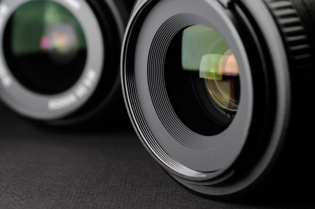 Camera lens close-up on black backgroundの写真素材