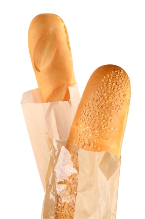 Two French Baguettes in paper bags isolated on whiteの写真素材