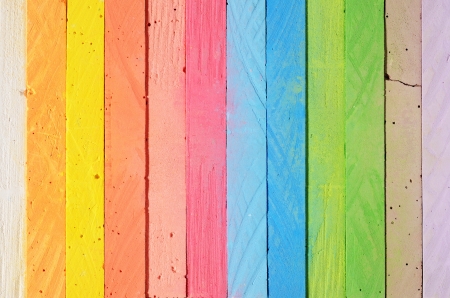 Multicolored chalk sticks arranged in a row  May be used as backgroundの写真素材