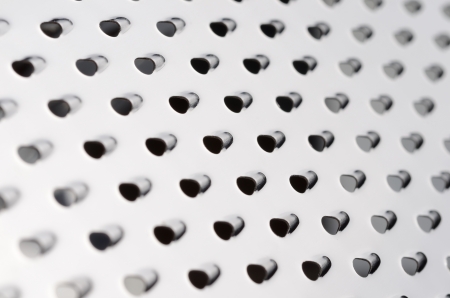 Metal grater extremly close upの写真素材