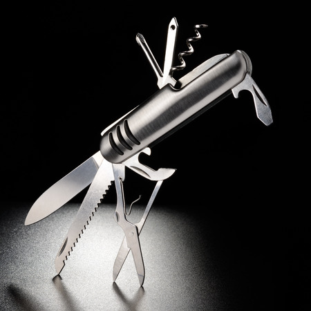 All purpose pocket knife on black backgroundの写真素材
