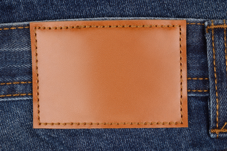 Leather jeans label sewed on jeans cloth