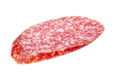 Oval salami sausage slice isolated on white background. Macro Shotの写真素材