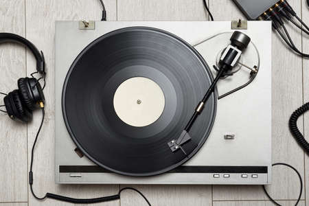 Vinyl player with long play or LP record and old-fashion headphones. Top view.の写真素材