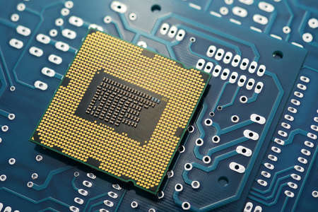PC CPU on printed circuit board pcb with electronic components. Close-up macro shot.