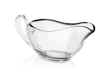 Empty glass gravy boat isolated on white background. 3D rendering illustration.の写真素材