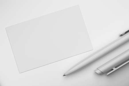 White blank business card with pen mock-up template. 3D rendering illustration.の写真素材