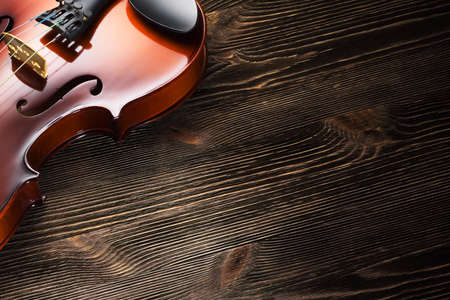Violin on wooden table with copy space.の写真素材